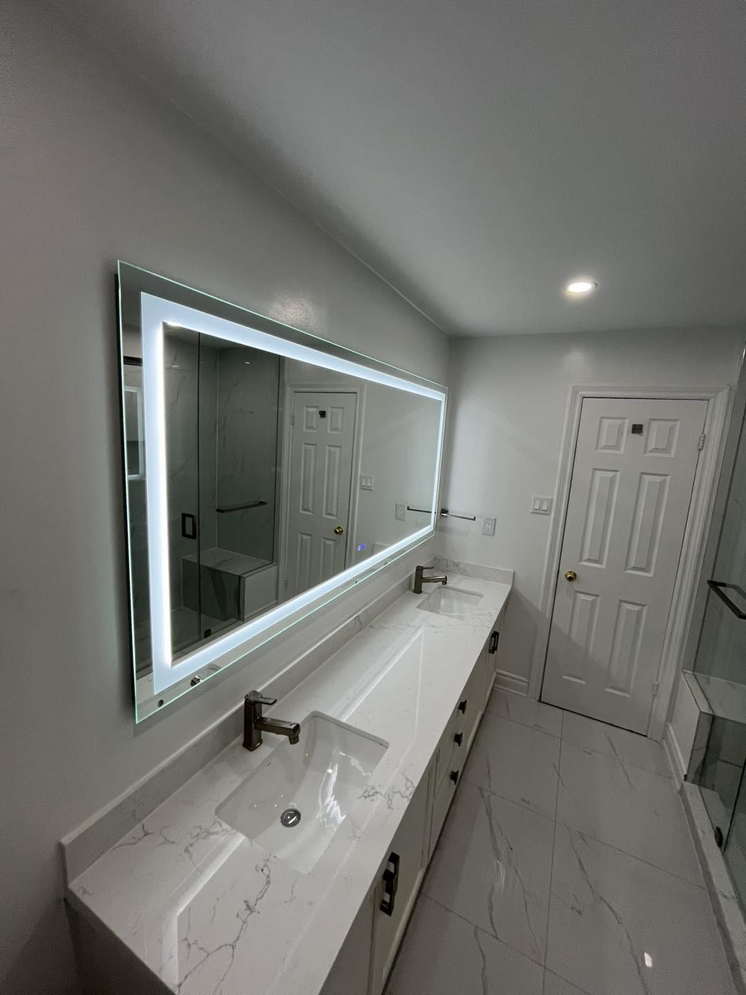 Primary Bathroom with Double Vanity and LED Mirror — image 1