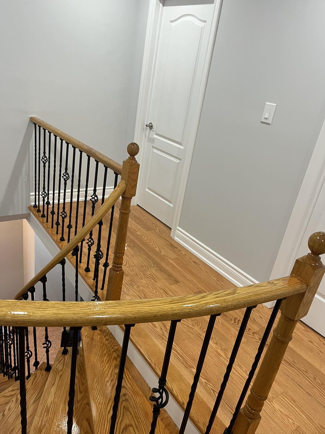 Staircase Renovation with Oak and Iron — image 1