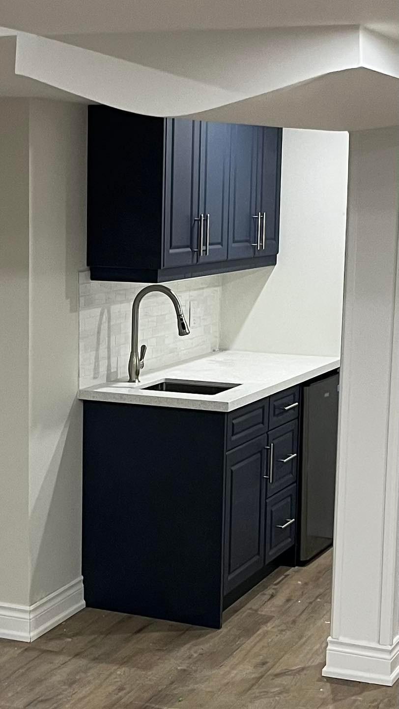 Modern Kitchen with Navy Cabinetry — image 1